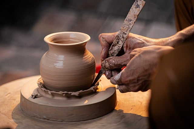 leather craftsman working hands